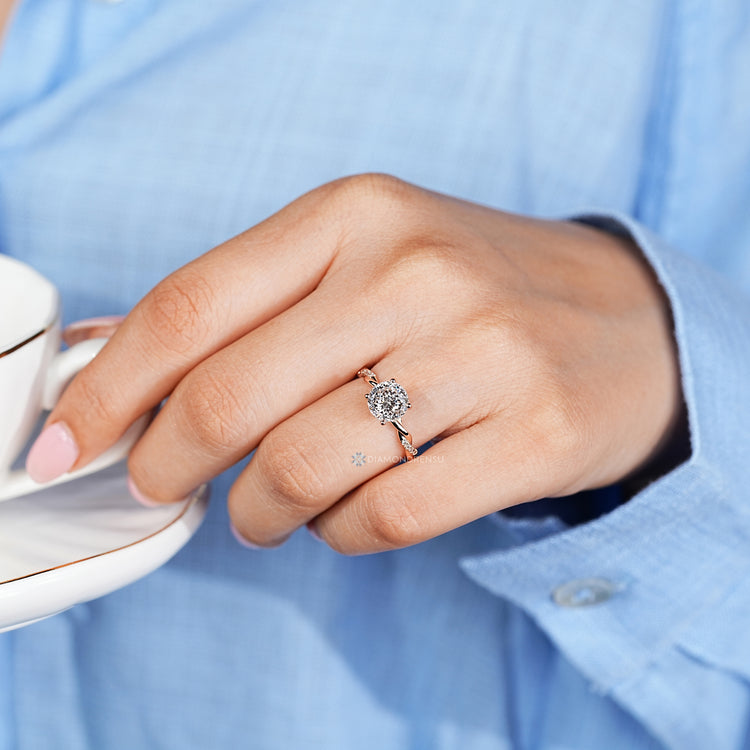Handmade twisted shank ring with hidden halo setting.