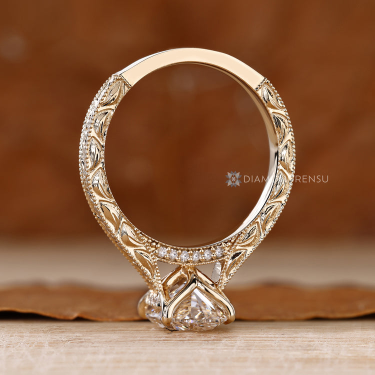 Oval cut diamond ring with cathedral setting.