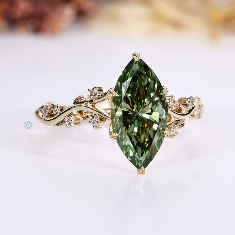 Marquise ring with hidden round blue topaz.