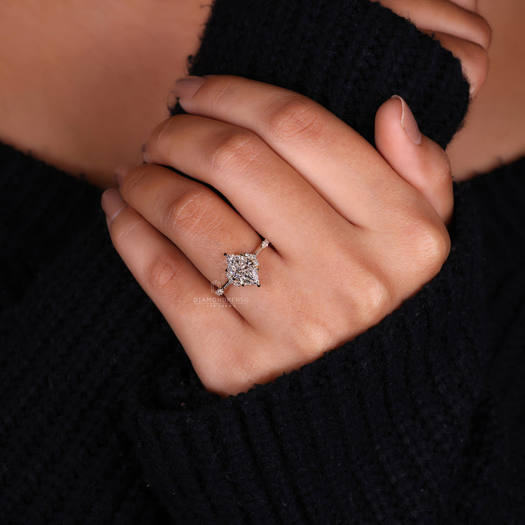Dutch marquise ring with muse setting and knife edge band.