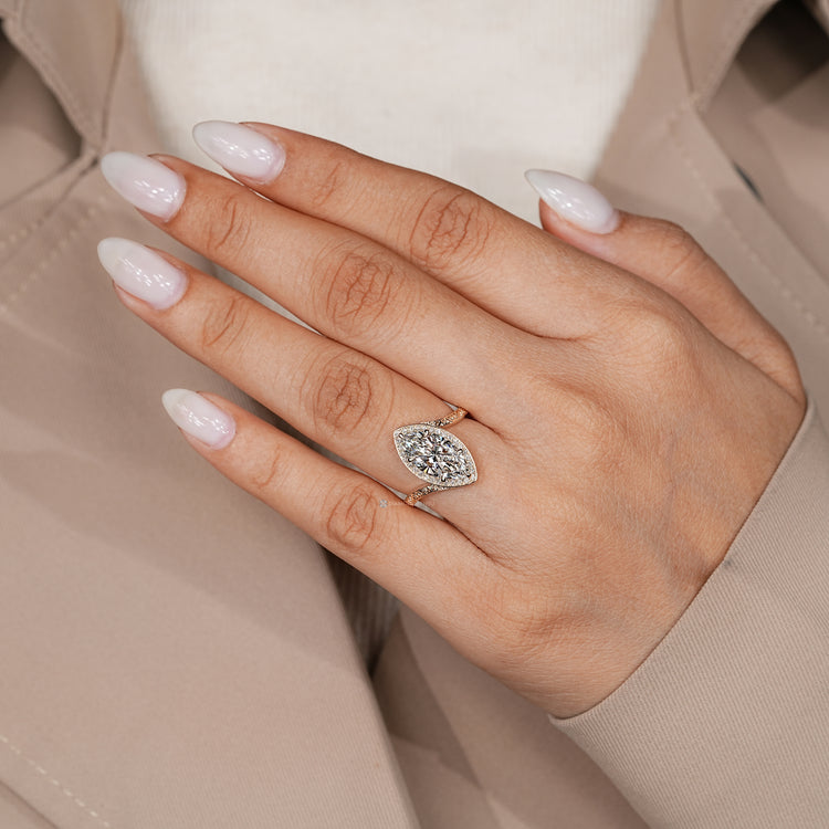 Handmade pavé engagement ring with halo setting.