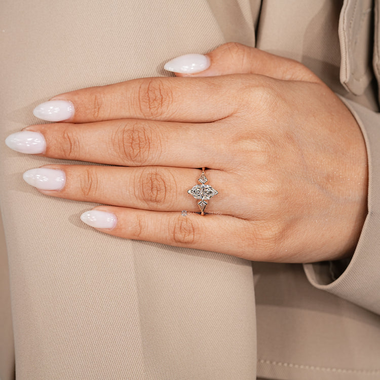 Dutch marquise ring with three stone setting.
