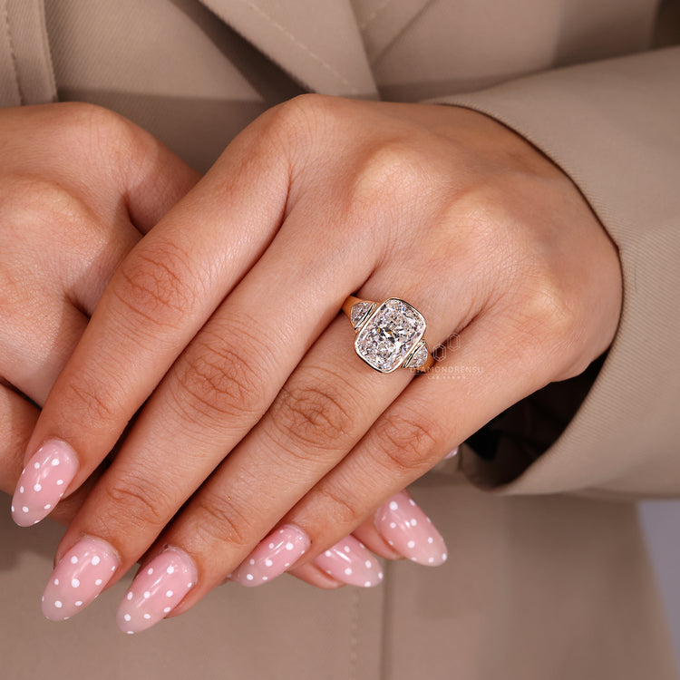 Lab grown cushion diamond ring with three stone style.