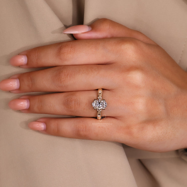 Oval cut ring designed in art deco ring style.