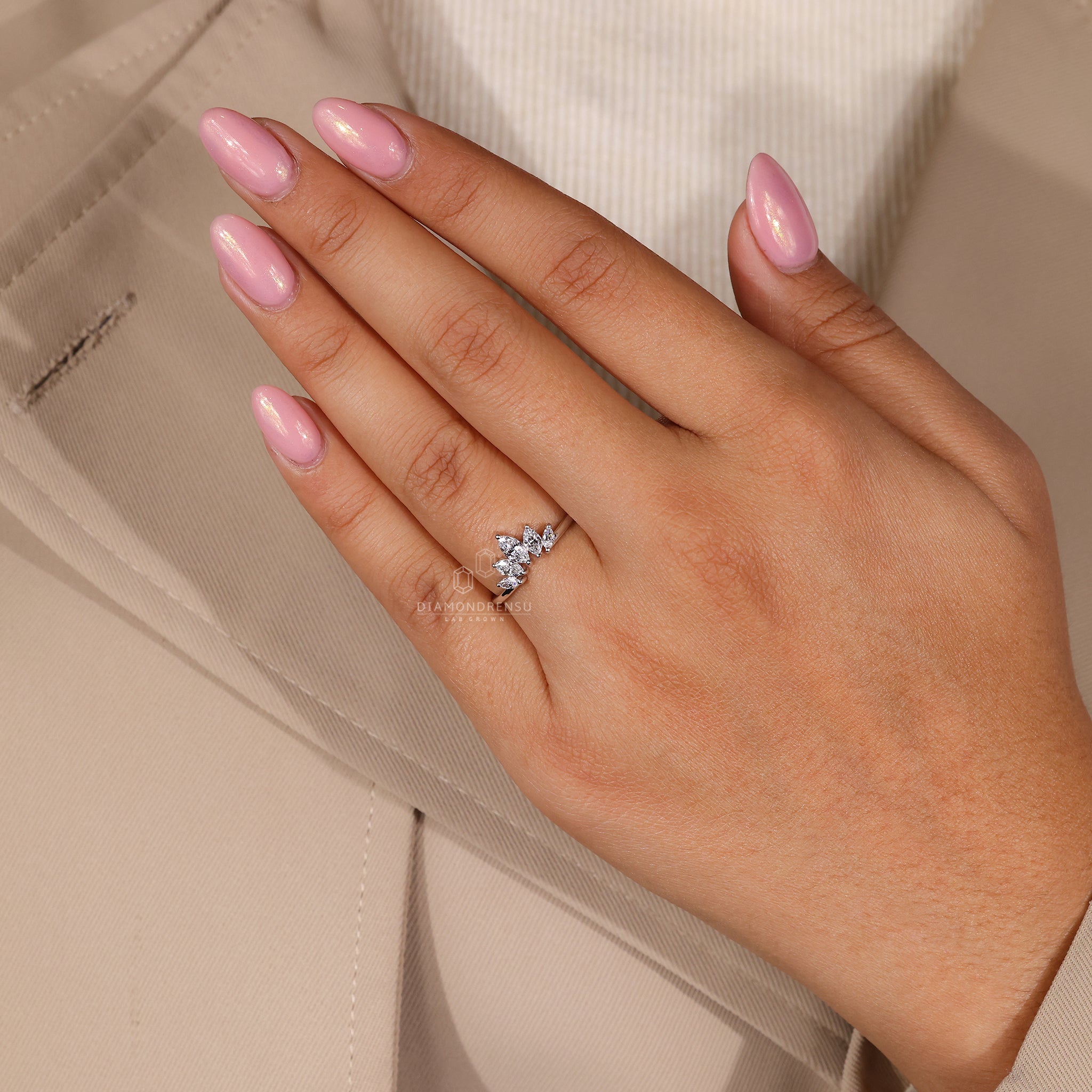 Custom diamond band handmade with lab grown marquise diamonds.