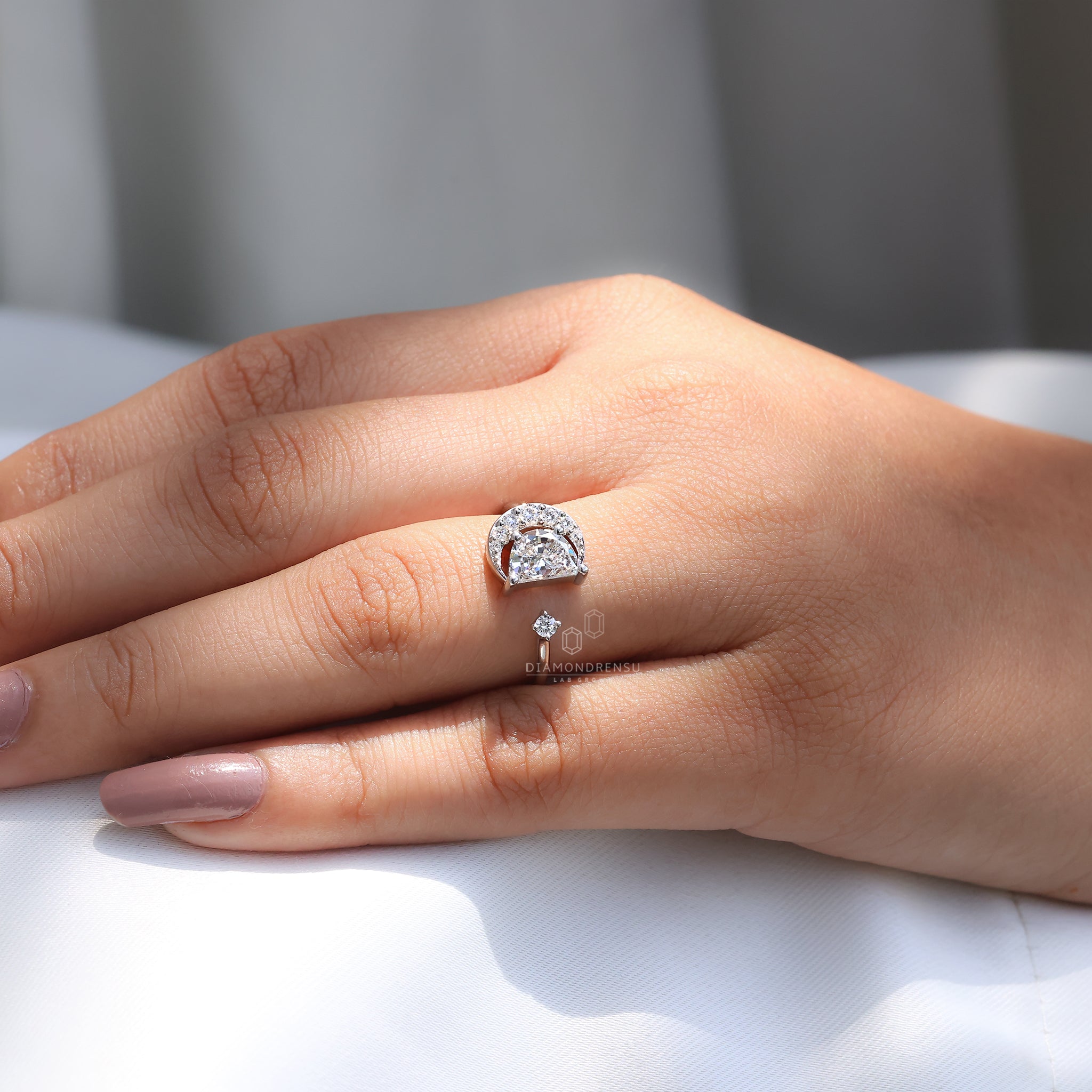 Lab grown diamond ring with moon-inspired fidget design