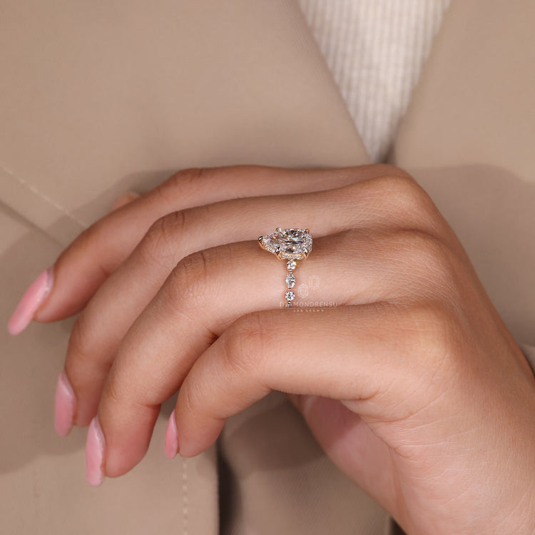 Custom engagement ring with hidden halo and claw prongs.