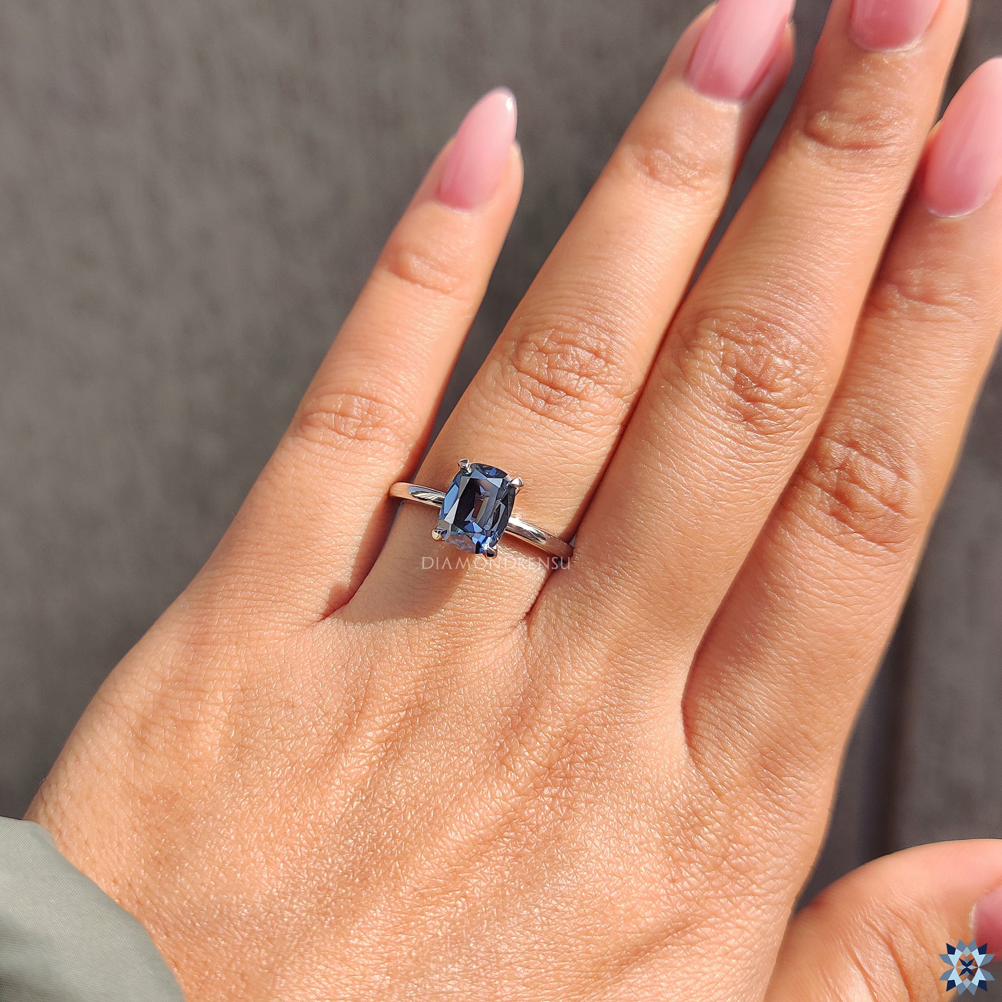 White gold ring in 4 claw prong setting