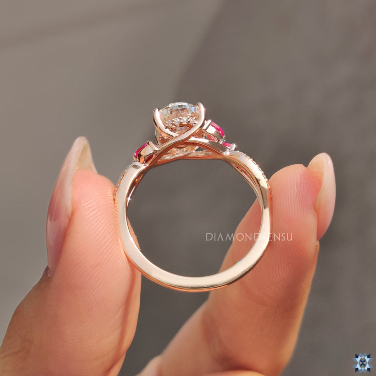 Twisted pave ring crafted in a 4 prong setting with hidden halo sparkle.