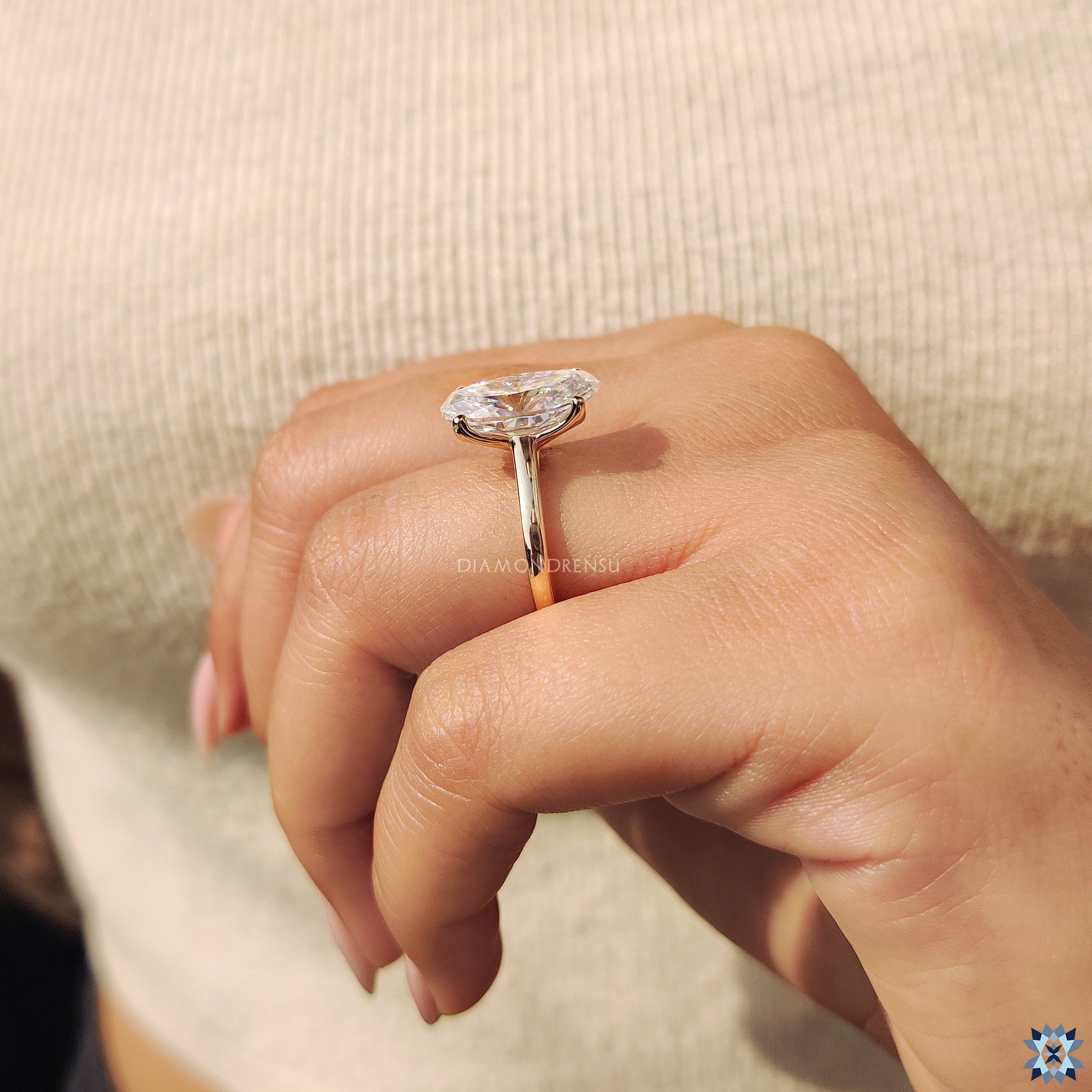 Custom engagement ring in moval cut engagement ring style