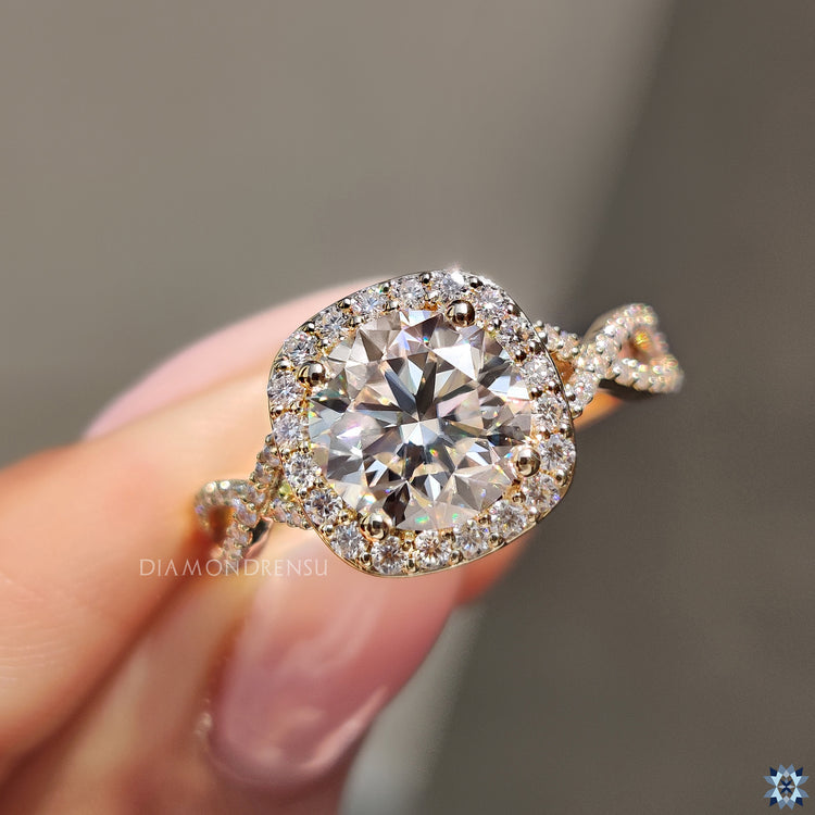 Buy moissanite ring with halo setting and round cut centre stone.