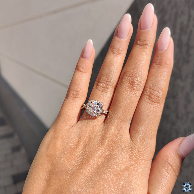 Twisted pave ring with round moissanite and handmade yellow gold band.