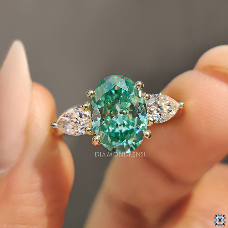 Moissanite ring with pear and oval engagement ring