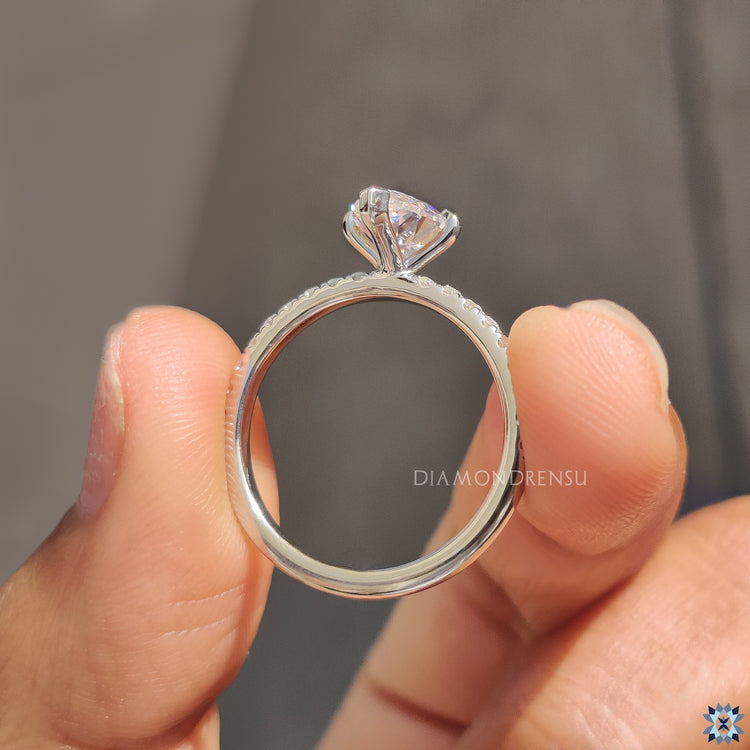 Buy moissanite ring featuring pear shape and v shaped prongs.