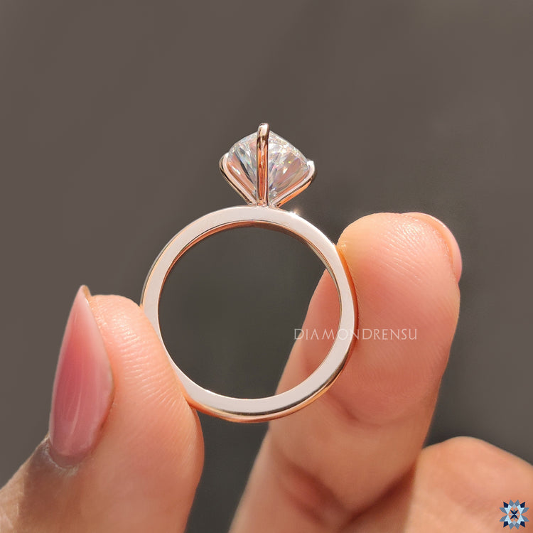 4 Compass prong ring in marquise cut ring style