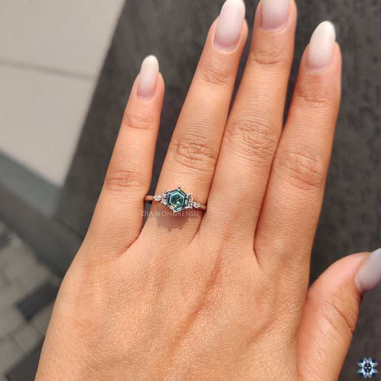 Muse ring setting with marquise and round moissanite ring