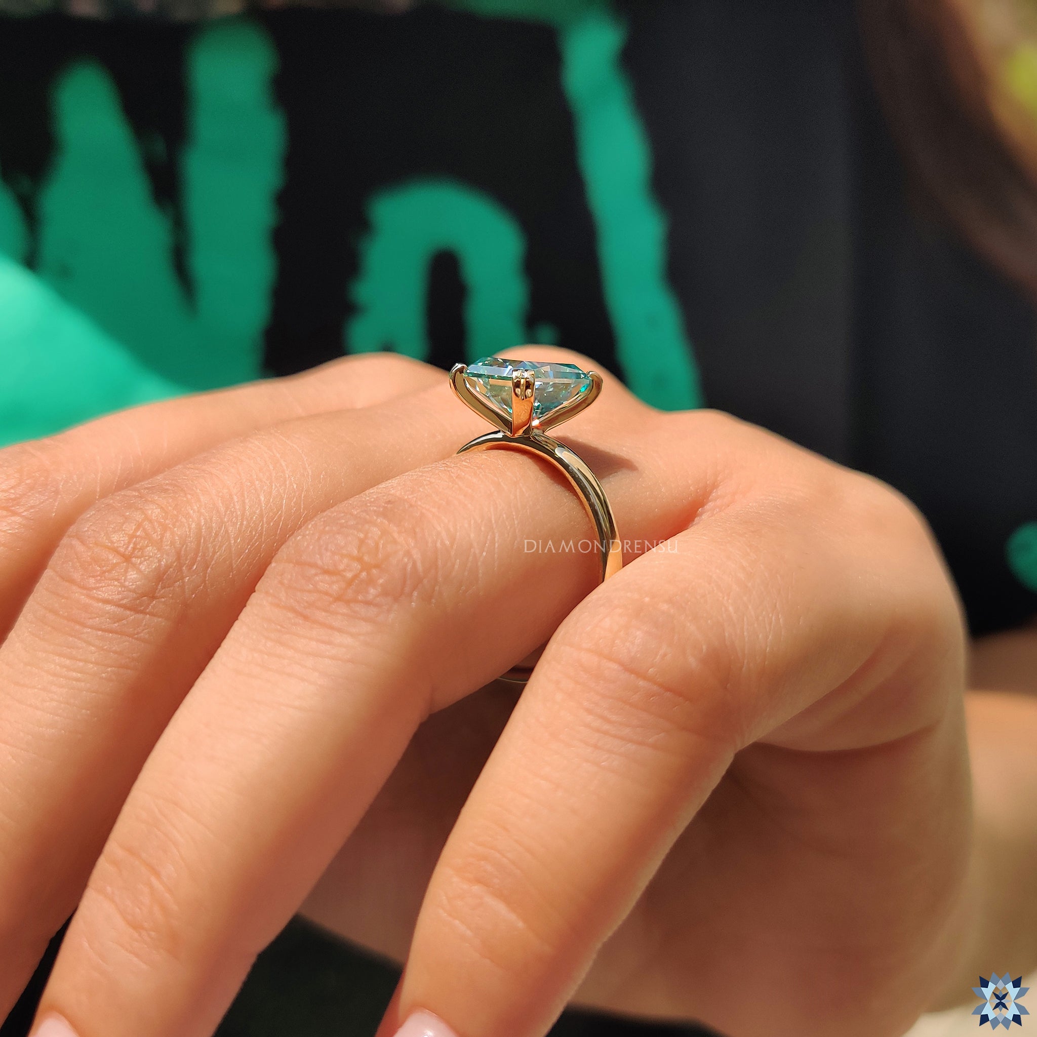 Buy engagement ring with radiant cut cyan blue moissanite today.