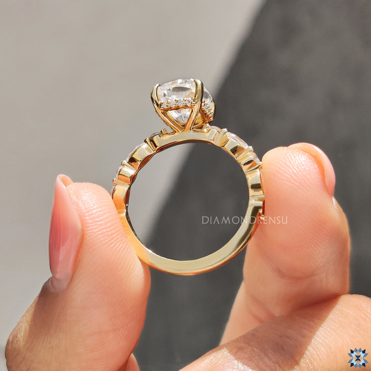 UK engagement ring with cushion cut moissanite and round hidden halo sparkle.