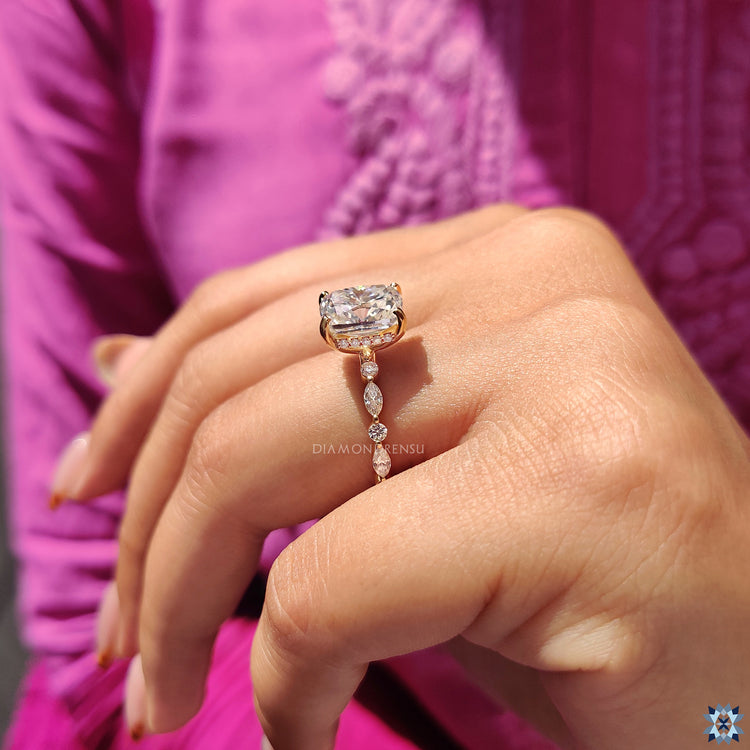 Buy engagement ring with marquise and round cut band in yellow gold setting.