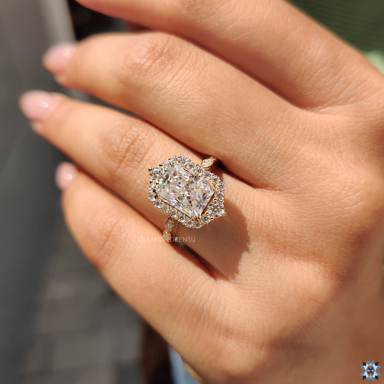 Diamondrensu UK yellow gold radiant moissanite ring with round cut pave band.