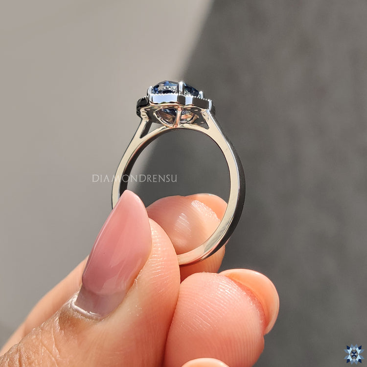 Buy engagement ring with handcrafted oval Moissanite and elegant vintage halo style.