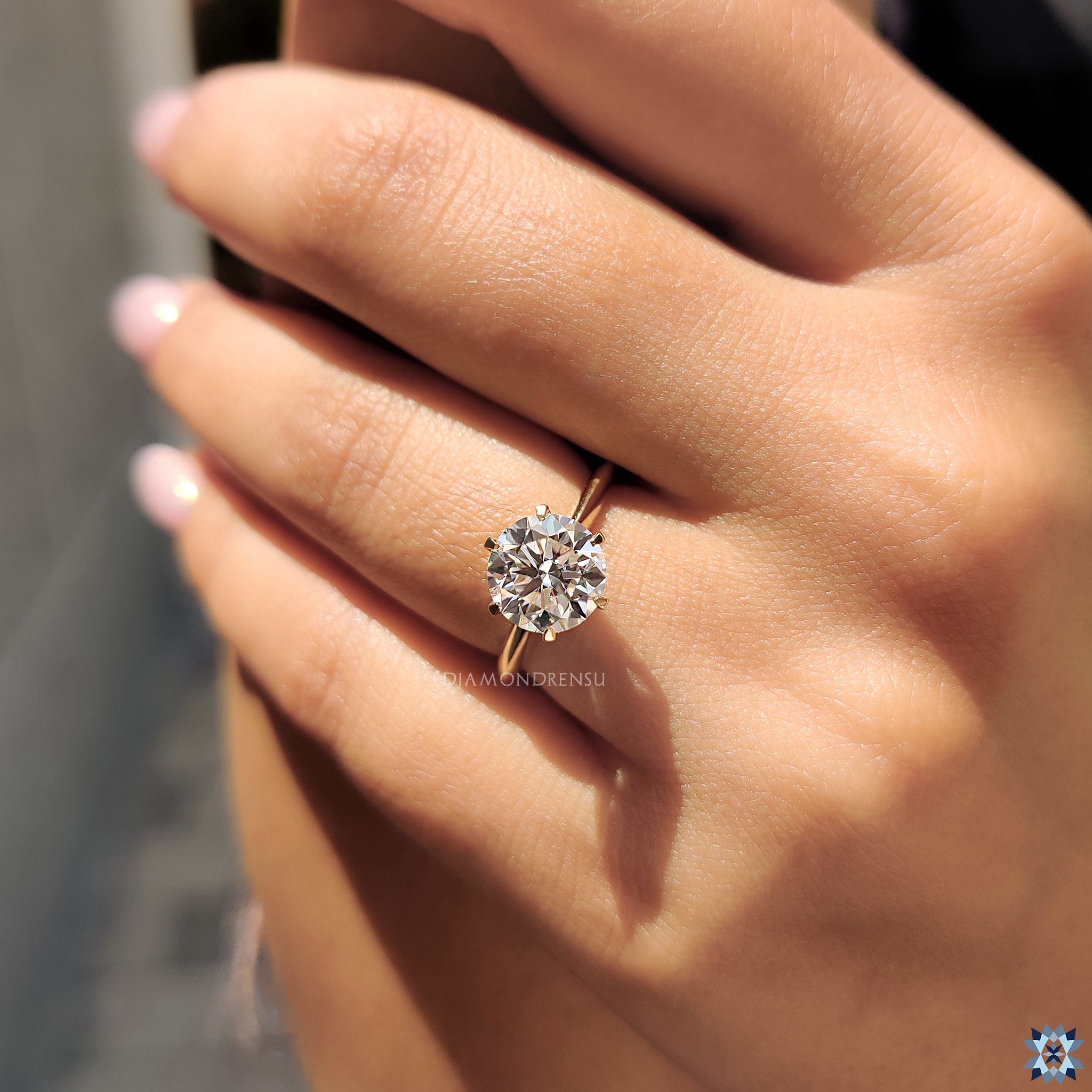 Buy engagement ring with round cut moissanite and classic 6 claw prong design.