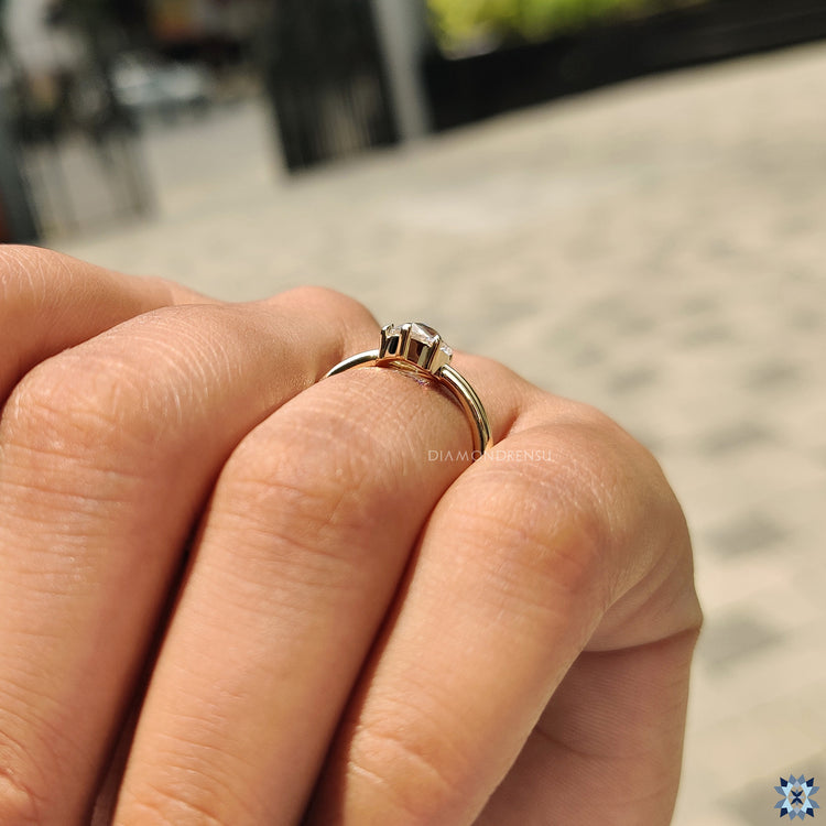 Diamondrensu UK engagement ring with unique rose cut Moissanite solitaire.