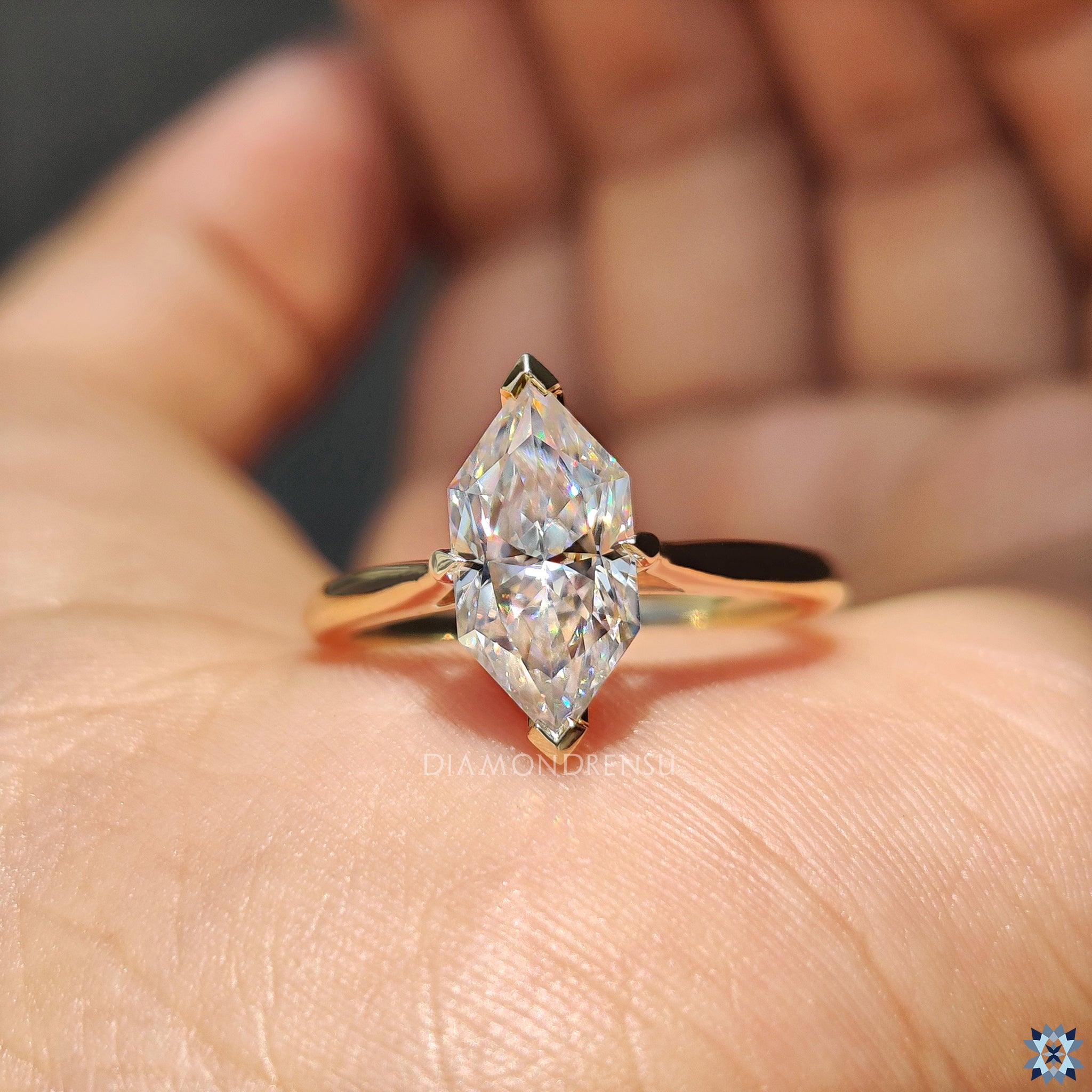 Moissanite for an engagement ring with unique Dutch marquise solitaire design.
