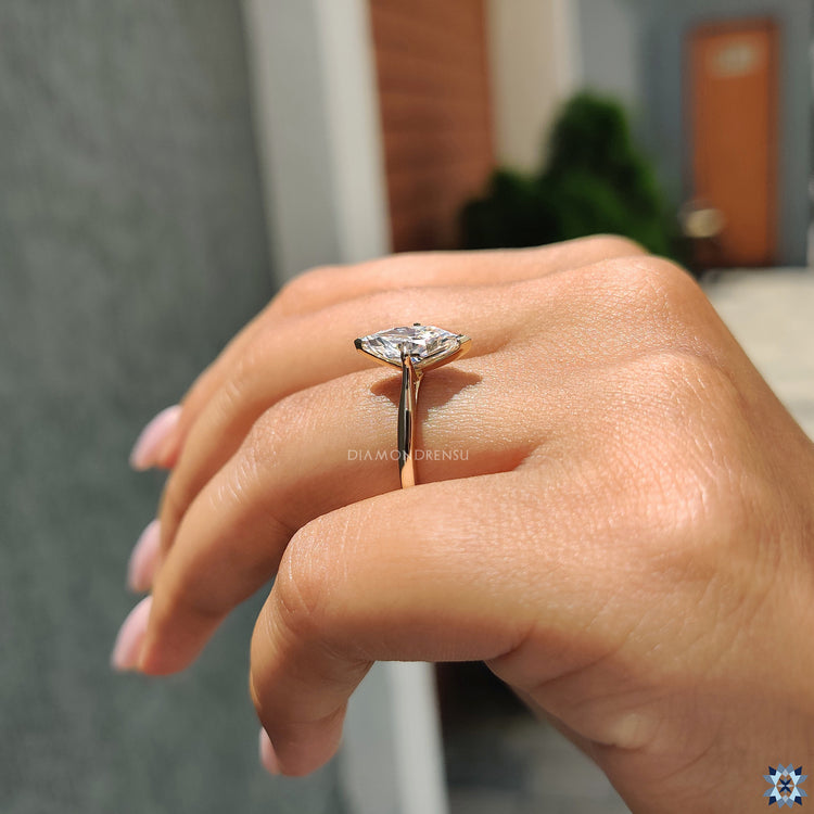 Buy engagement ring with Dutch marquise cut in handmade yellow gold design.