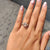 Handmade yellow gold engagement ring with emerald and pear moissanite stones.
 Handmade yellow gold engagement ring with emerald and pear moissanite stones.