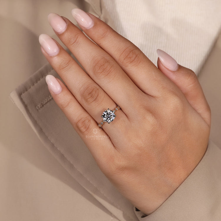 Milgrain setting ring crafted in white gold.