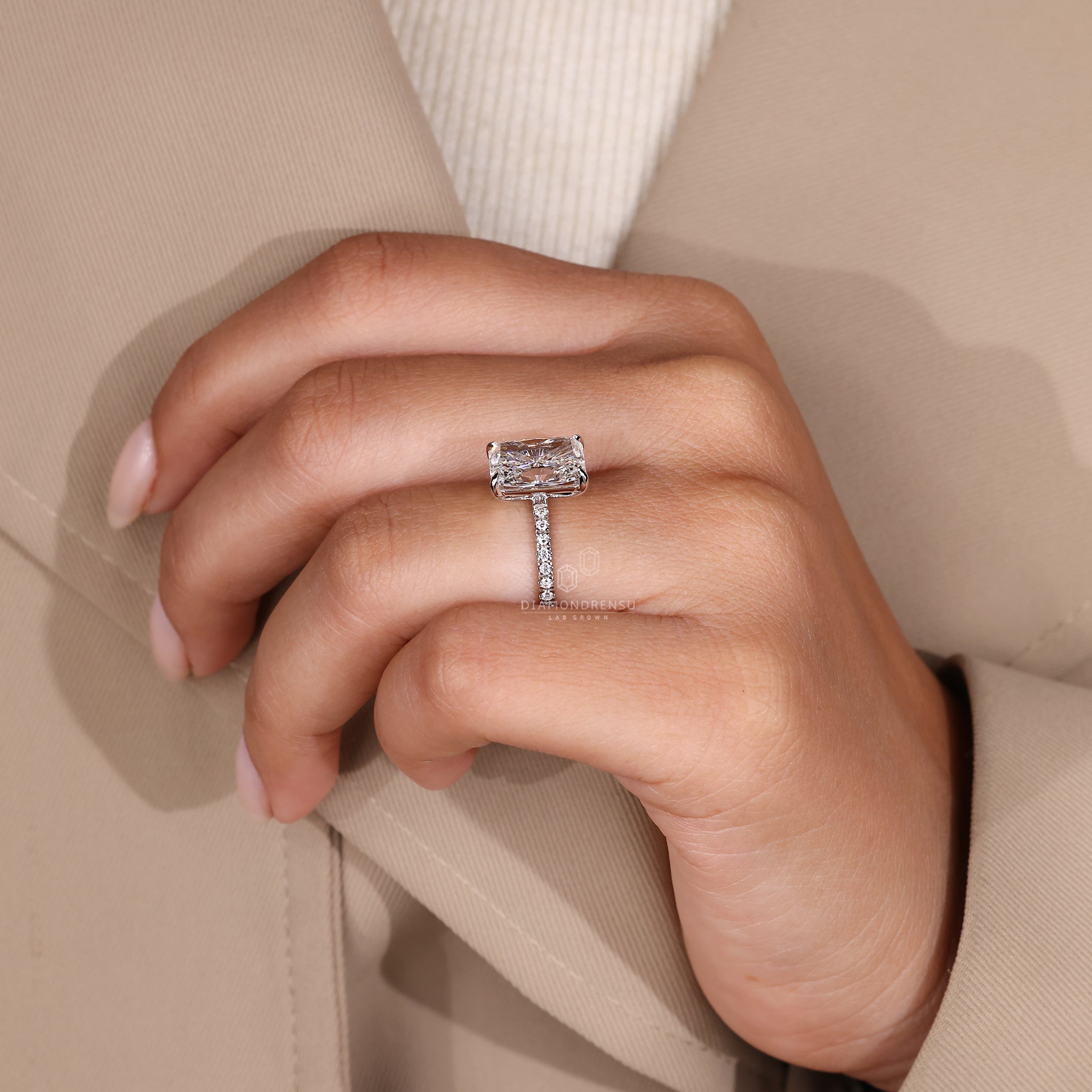 Engage Ring UK includes radiant diamond and pave detail.