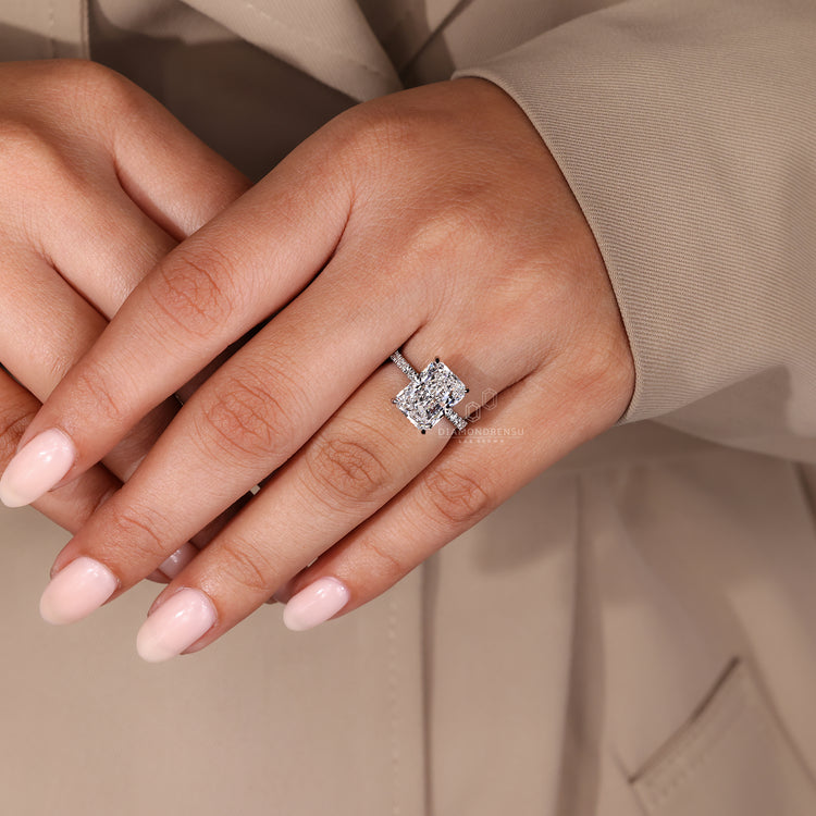 Handmade ring includes pave and 4 prong design.