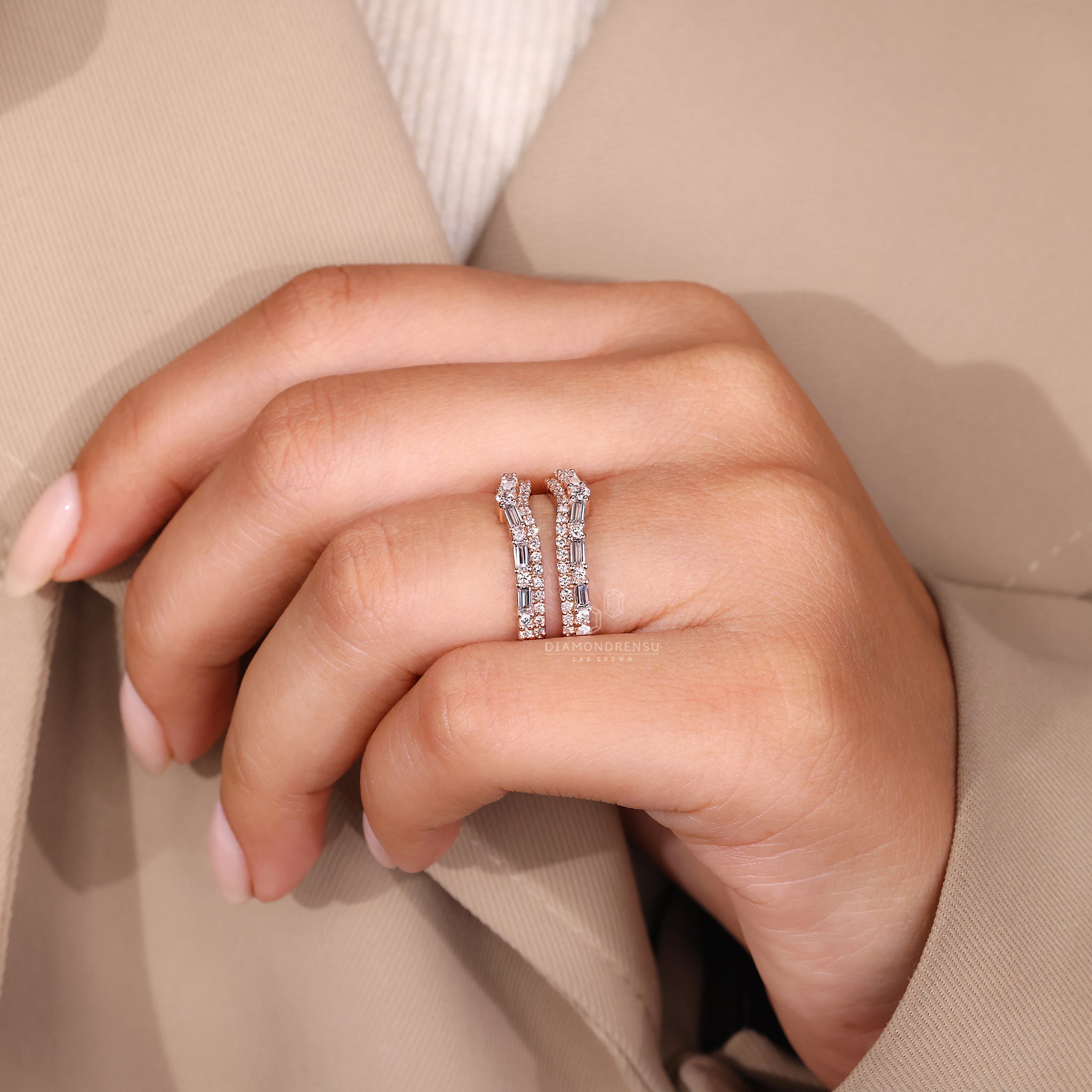 Enhancer ring band with baguette and round stones.