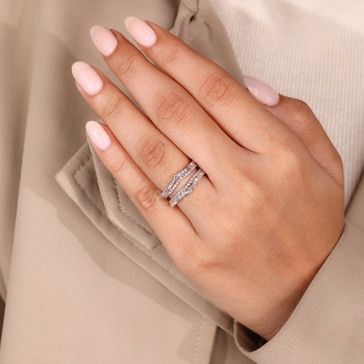 Handmade ring with baguette and round diamond layout.