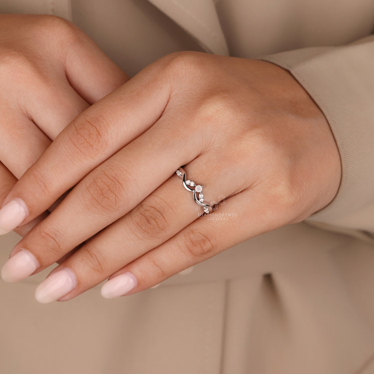 Cluster wedding band with white gold and moonstone.
