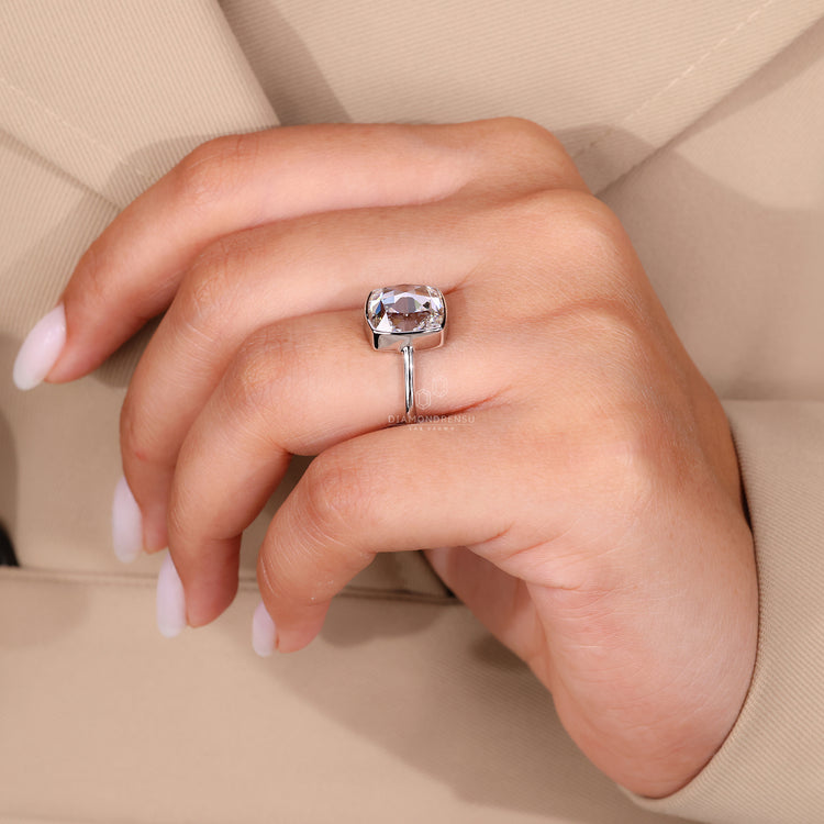 Prong setting ring with cushion diamond center