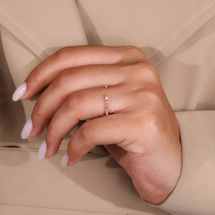 Simple wedding band crafted from yellow gold with a clean finish.