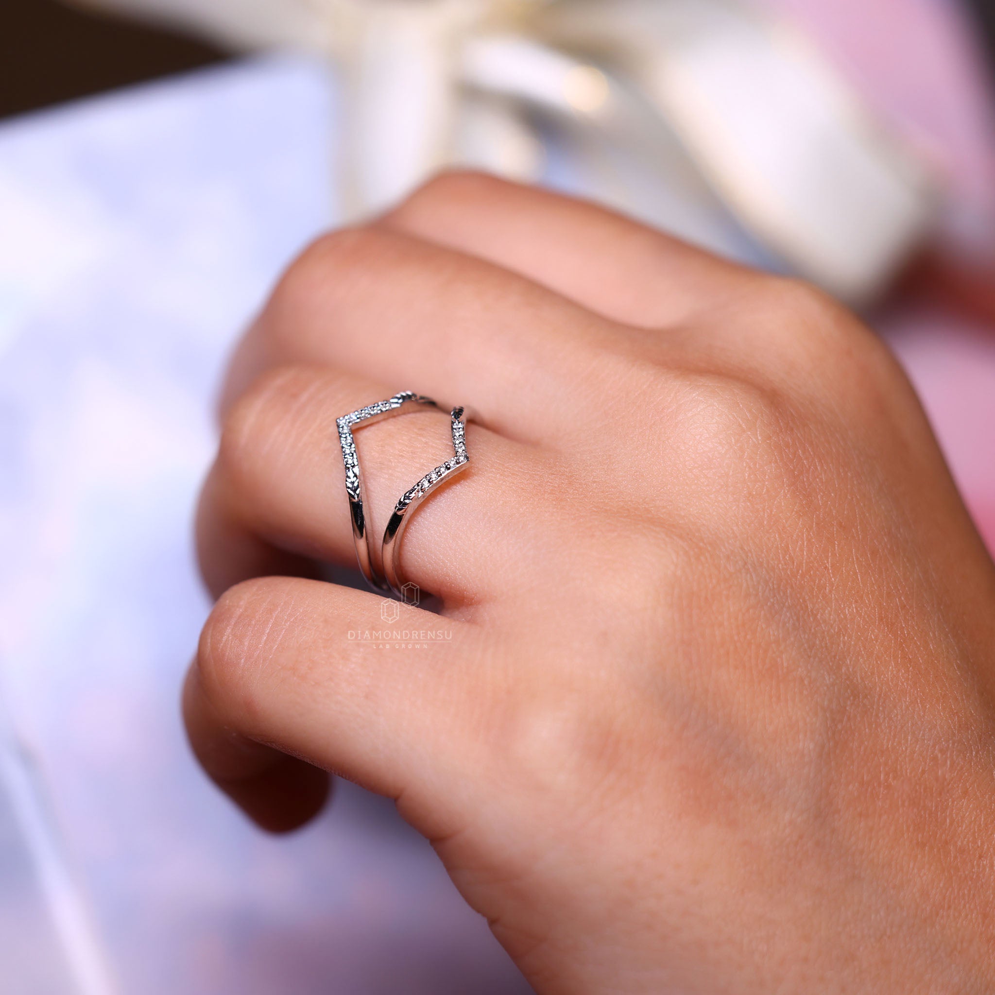 Enhancer wedding band with lab grown diamonds.