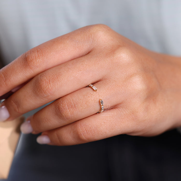 Yellow gold diamond band featuring a mix of marquise and baguette cuts.