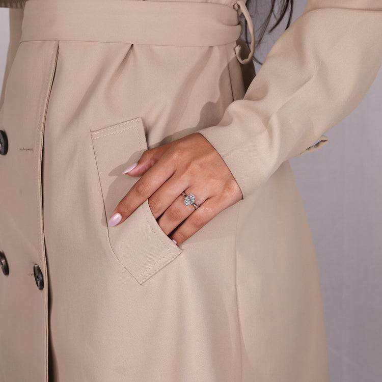 Diamond engagement ring with four prong halo design