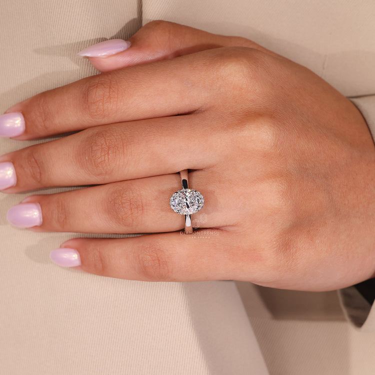 White gold engagement ring with tapered shank band