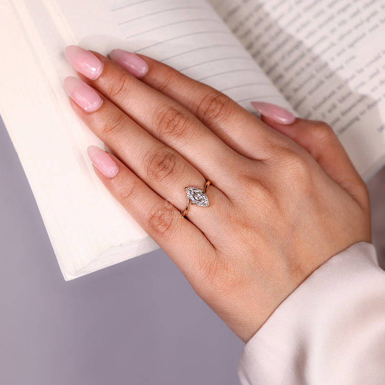 Solitaire engagement ring with bypass setting and IGI certified lab grown diamond.