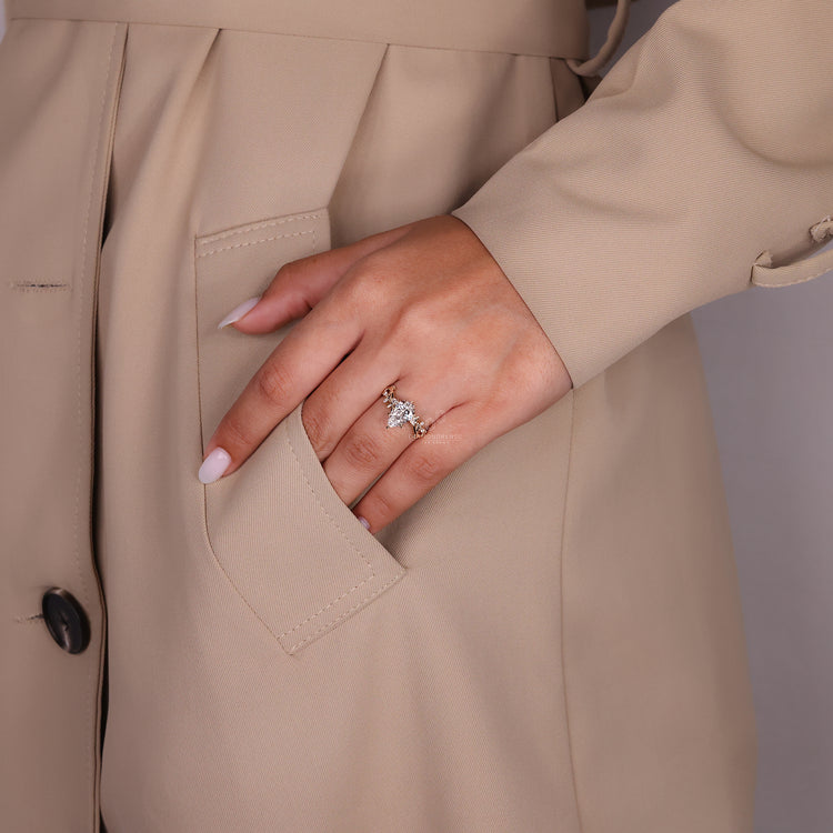 Lab grown diamond engagement ring in marquise and round diamond style.