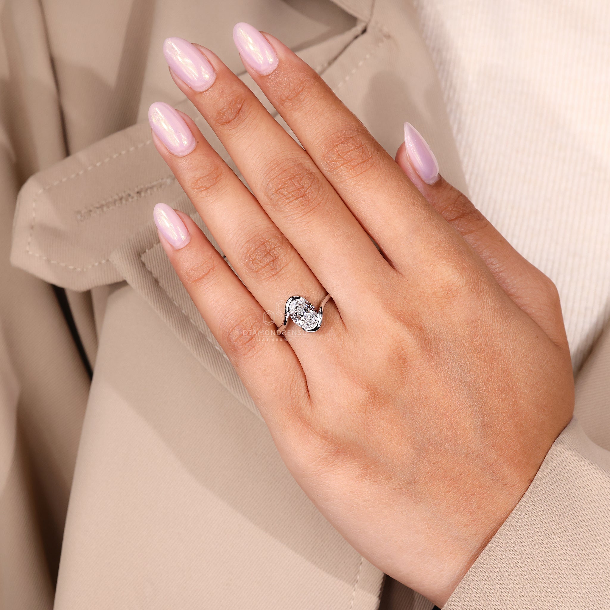 Lab Grown Diamond ring with solitaire and amethyst details.