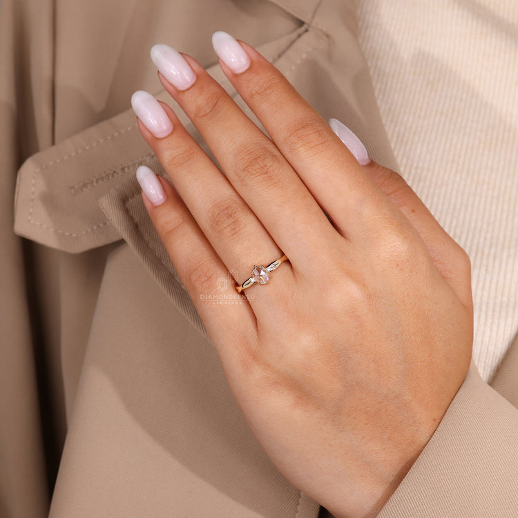 Oval diamond ring with 6 claw prong setting