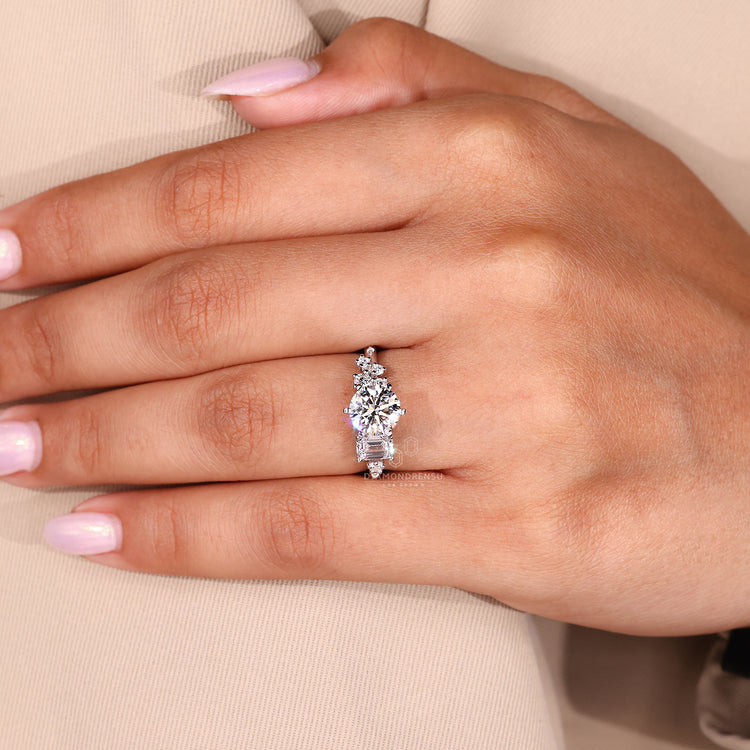 Unique ring with round and emerald lab grown diamonds.