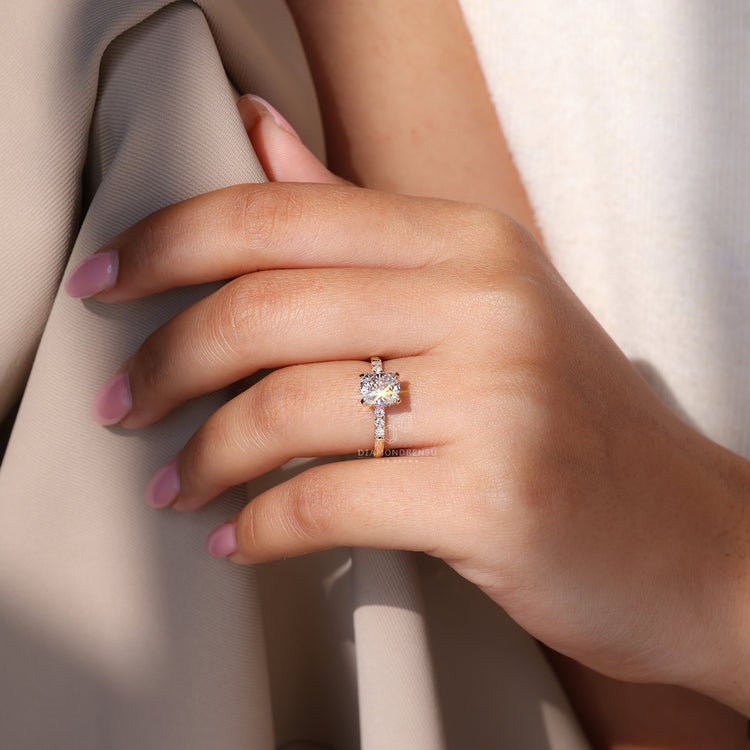 Round diamond ring added as side stones.