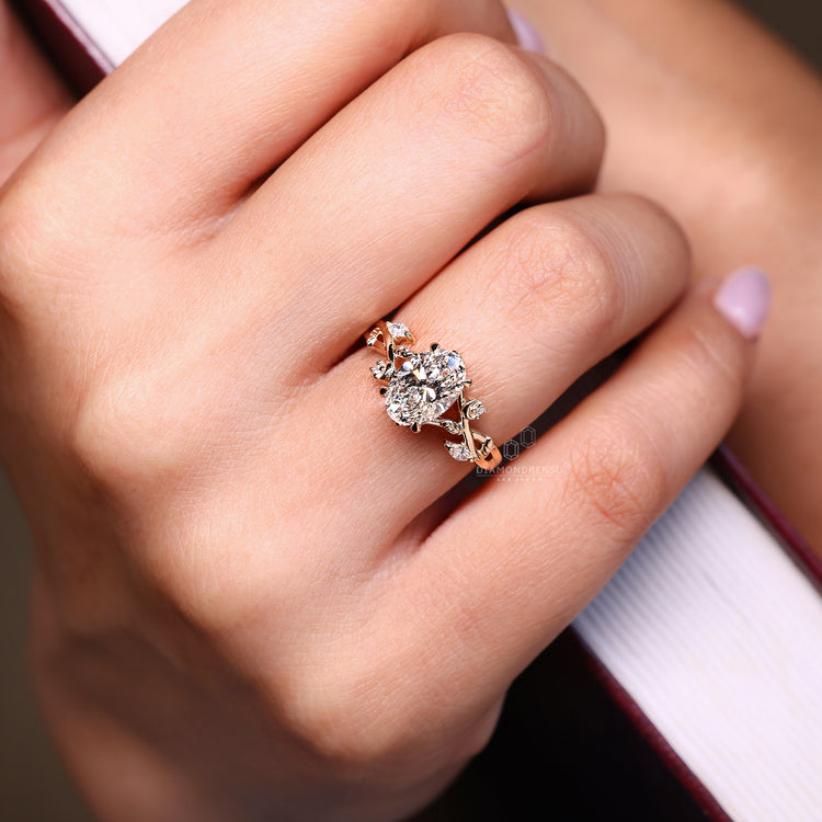 IGI certified gold oval diamond ring with round side stones