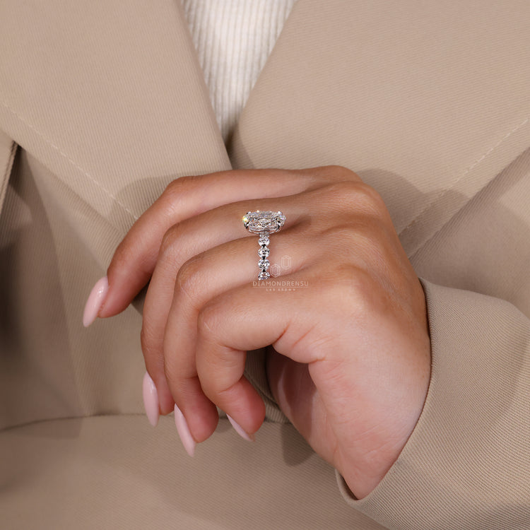 Floating bubble prong ring holds each diamond safely.